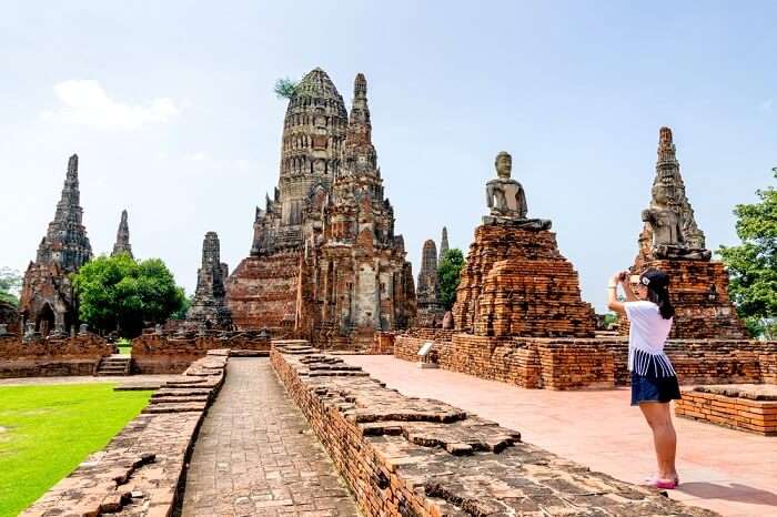 tourist visiting an old monument