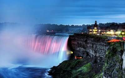 A colourful night view of Niagara Falls In Canada