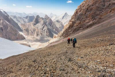 People trekking in Pamir Mountains