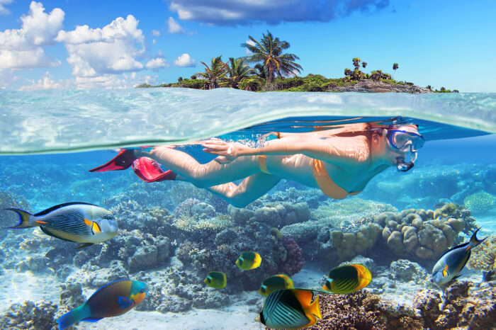 A woman snorkeling in Bahamas