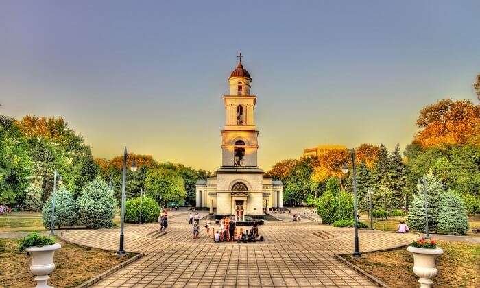 tourist near bell tower in chisinau