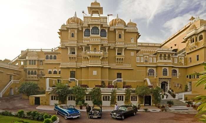 vintage cars outside deogarh palace