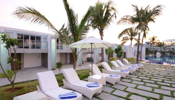 beach chairs with umbrella in a hotel