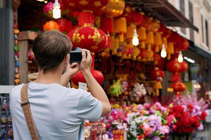 person capturing the market