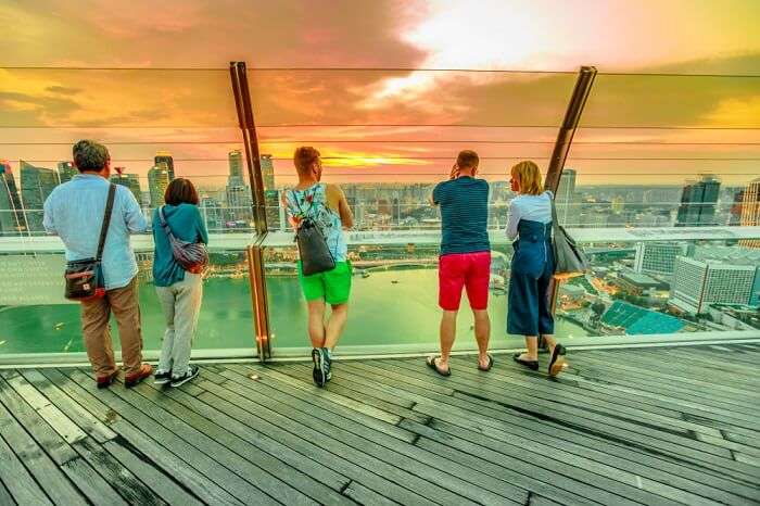 People looking at sunset