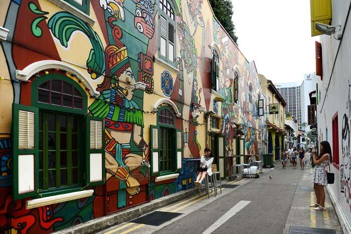 Friends clicking picture on Haji lane