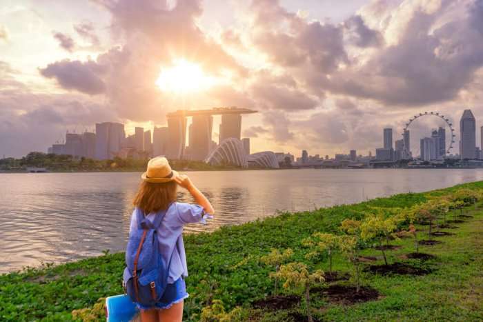 Tourist watching sunset in Singapore