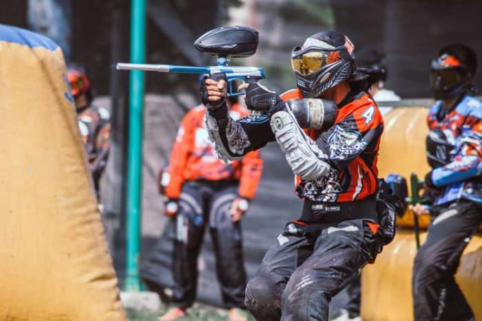 friends in singapore playing paintball