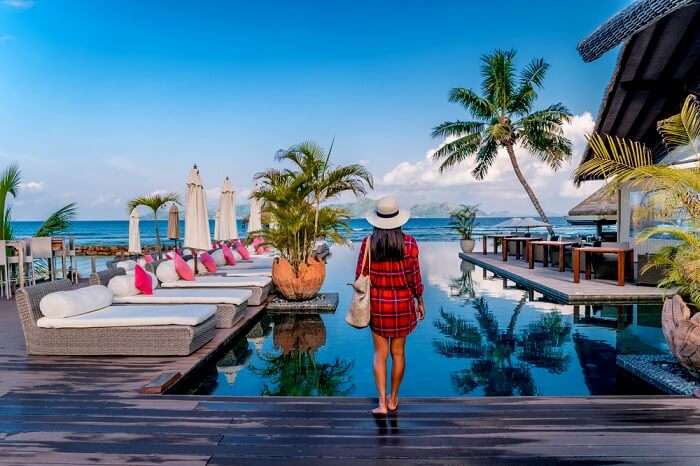 A girl standing at a resort