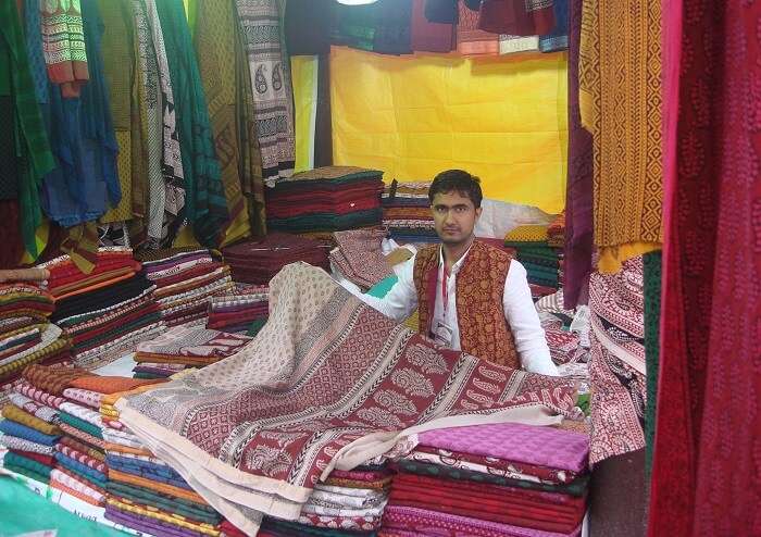 guy selling shawl