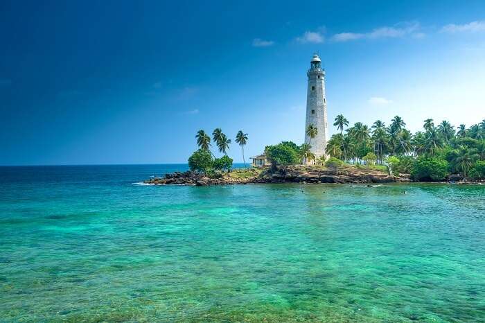 gorgeous view of the beach and lighthouse