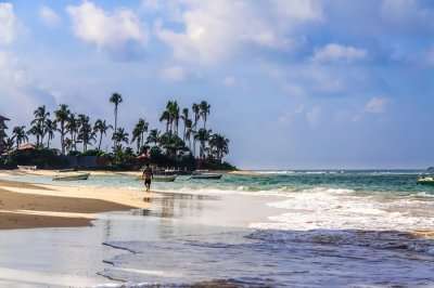 traveler on beach in sri lanka