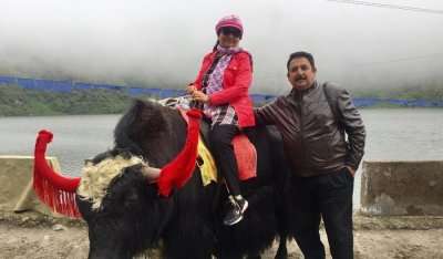 sitting on yak