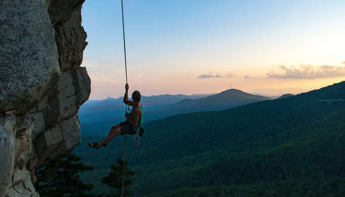 Doing Rappelling with Rope