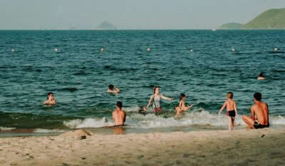 people swimming in sea