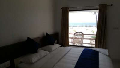 bedroom with a window at one of the Lakshadweep hotels
