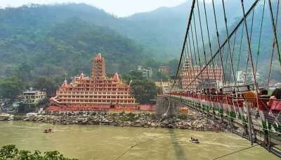Rishikesh, one of the top places to visit in Uttarakhand in July for Hindu pilgrimage.