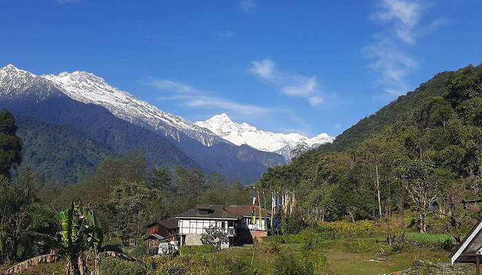A picturesque valley nestled between the hills of Sikkim, one of the best places to visit in Sikkim in June.