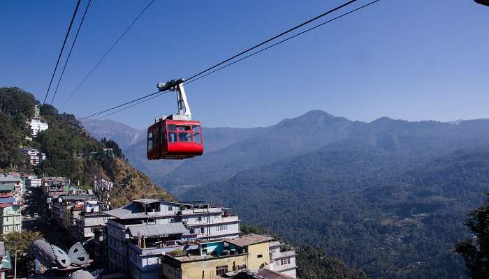 Riding cable cars is popular in gangtok, making it one of the best places to visit in Sikkim in June.