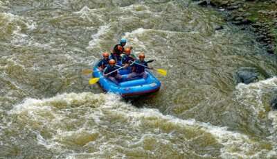 People going river rafting in Kerala with family and friends
