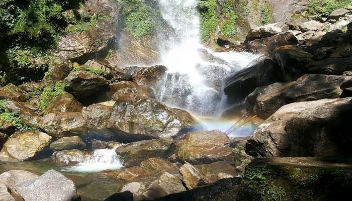 A picturesque waterfall in Sikkim, one of the nicest places to visit in Sikkim in June.