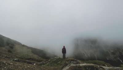 Trekking in Munnar on a foggy day.