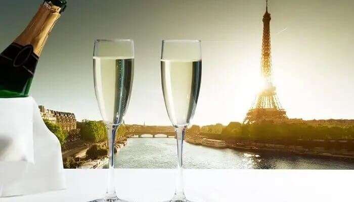 wine in front of eiffel tower paris