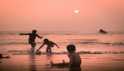 Stunning views of children playing on the Kozhikode beach