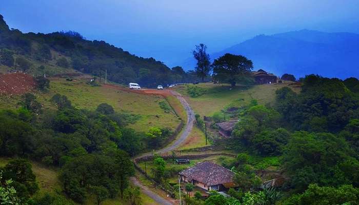 The great hills of Brahmagiri are one of the best places to visit in Coorg in July for trekking and camping.
