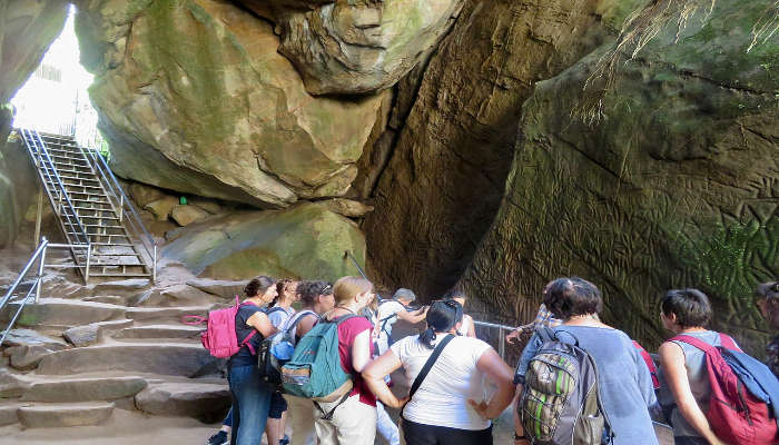 Exploring the Edakkal Caves is one of the best things to do in Wayanad