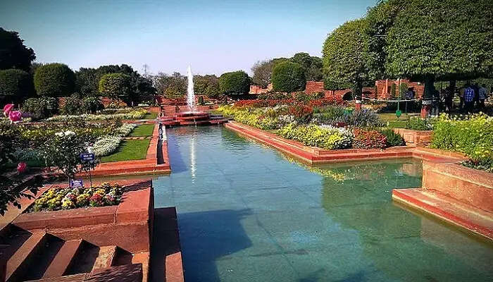 Mughal Gardens are covered with blossoming flowers.