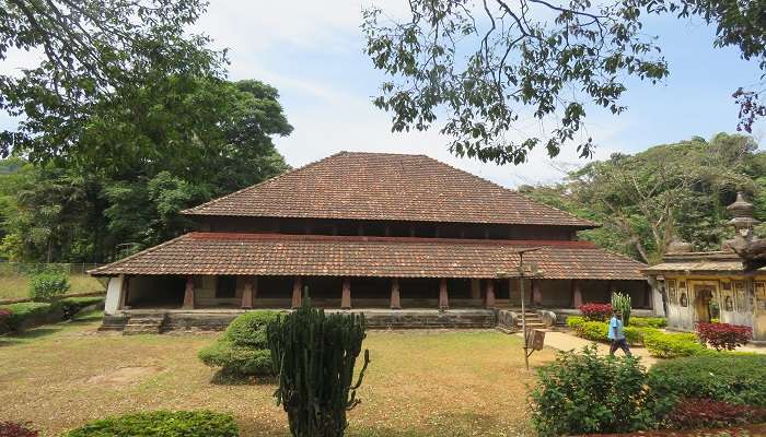 This modest but tranquil palace is one of the best places to visit in Coorg in July.