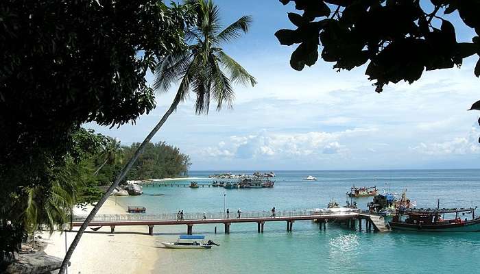 Enjoy the pristine beaches at Perhentian Island while heading out on a short trips from Singapore