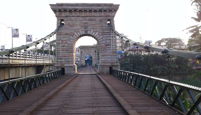 Punalur bridge, an old-world architectural beauty, is one of the top places to visit in Kollam.