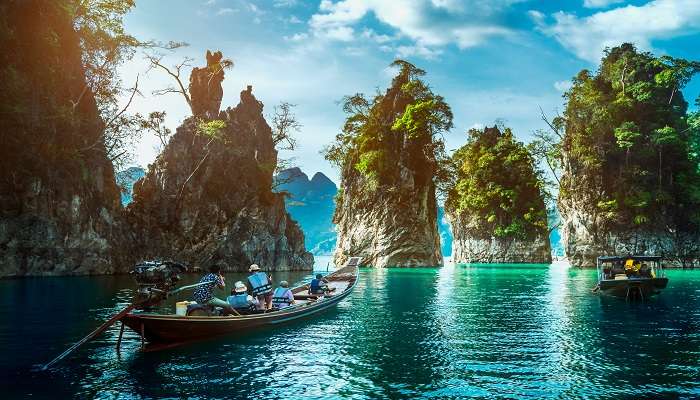 Landscape view of Khao Sok National Park with longtail boat for travellers