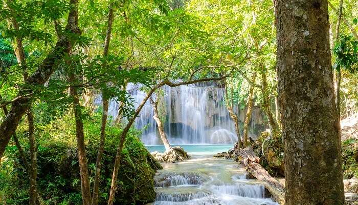 A majestic view of Erawan Waterfall in Thailand