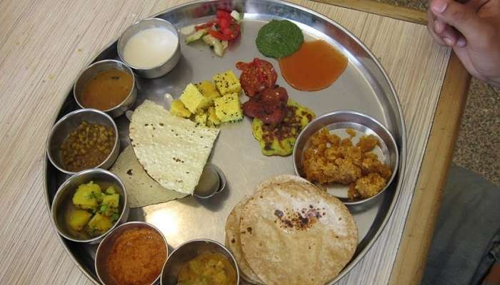 Relishing Gujarati Thali, things to do in Ahmedabad