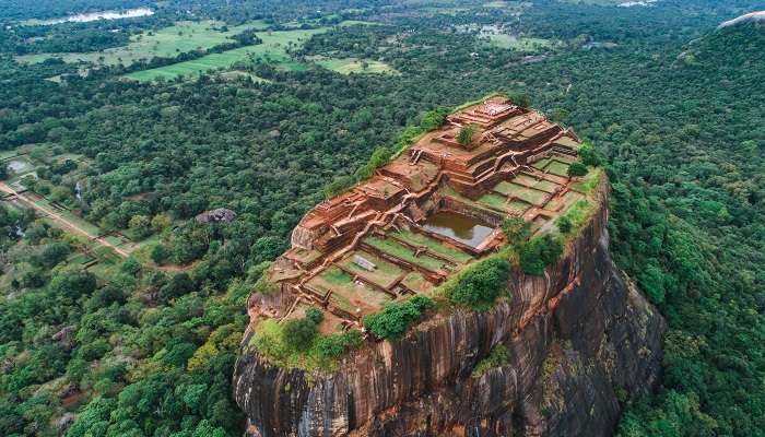 Get a panoramic view of Sigiriya Rock while planning day trips from Kandy