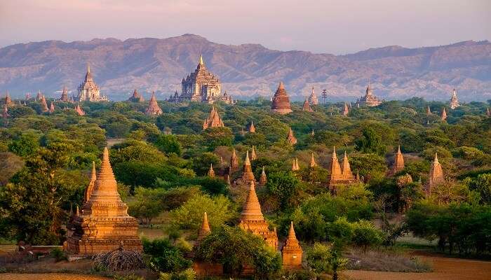 Sunrise landscape view with silhouettes of old temples