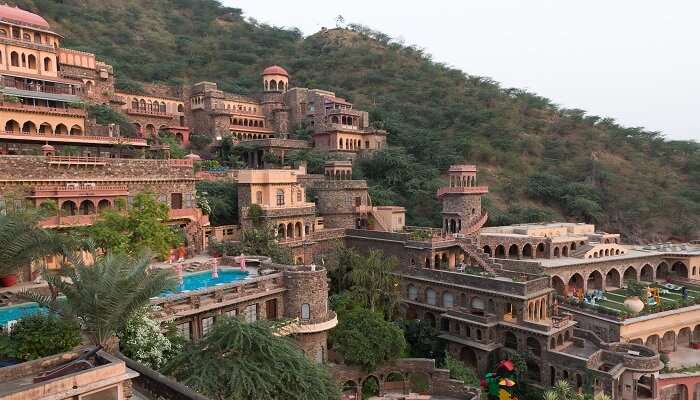 Revel in the Rajasthani culture at Neemrana while exploring the best places to visit near Delhi within 300 km
