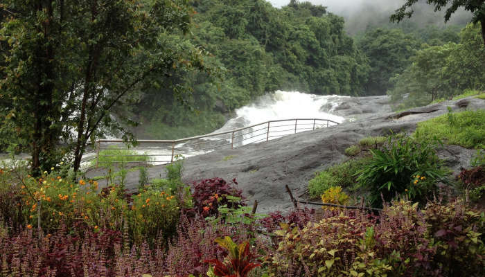 Enjoy breathtaking views of Adyanpara waterfalls, one of the best Nilambur tourist places