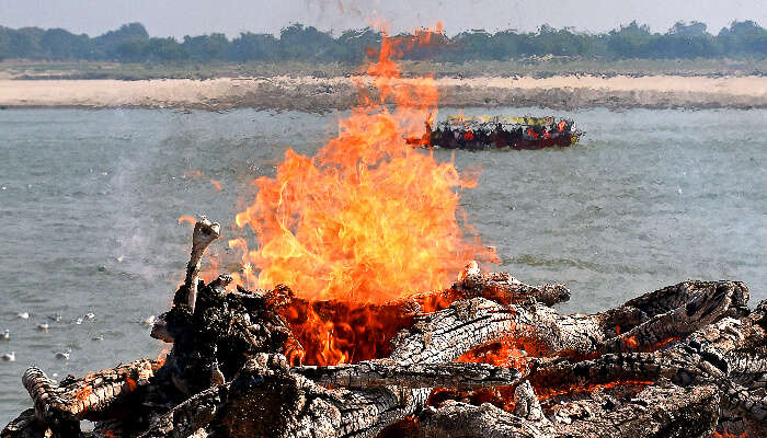 A scene of cremation at Manikaranika Ghat