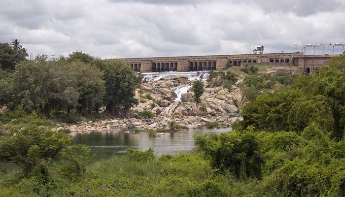 A scenic view of the Kaveri River flowing from Krishnaraja Sagara Dam, one of the places to see near Maddur