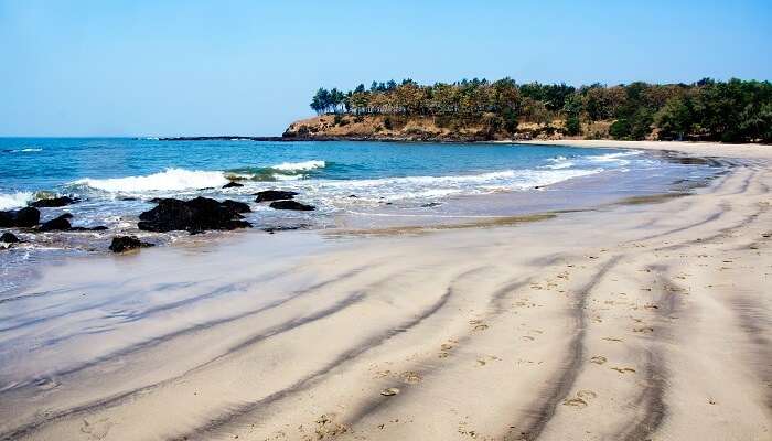 La vue des plages en Alibaug, c'est l'un des meilleur endroits à visiter en août en Inde