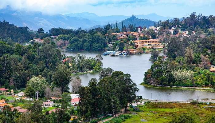 A glorious view of Kodai Lake, a picturesque hill station for planning a trip under 10000 for couples in India