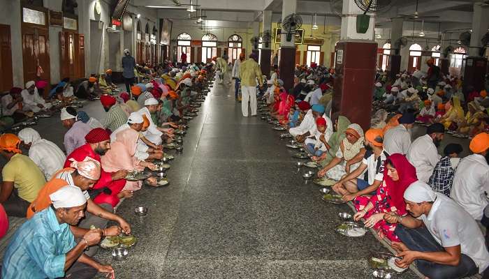 Devotees are served the langar at Golden Temple without any discrimination