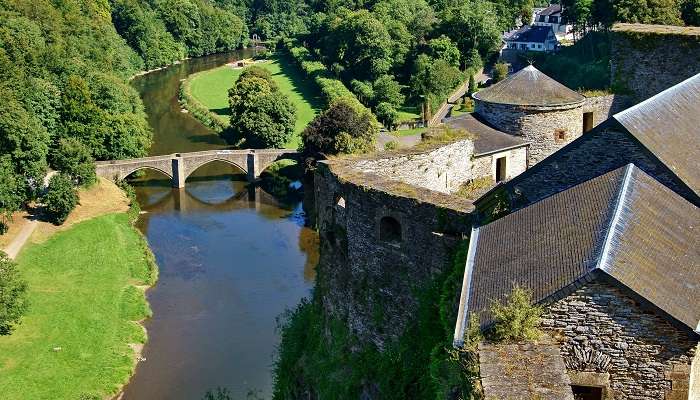 A panoramic view of the old bridge over the River Semois from the walls of the fortifications of the castle, located in one of the best small towns in Belgium, Bouillon