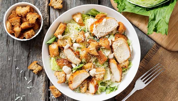 The lip-smacking Chicken Caesar Salad with parmesan cheese at Cafe 28, among the best Mexican restaurants in Abu Dhabi.