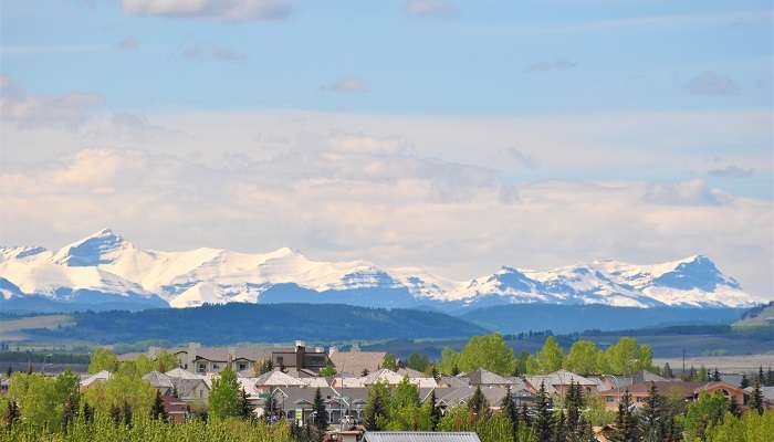 A panoramic view of the Canadian Rockies from one of the best small towns in Alberta, Cochrane