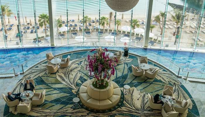 A luxurious view of Conrad Abu Dhabi Etihad Towers, one of the top beach resorts in Abu Dhabi